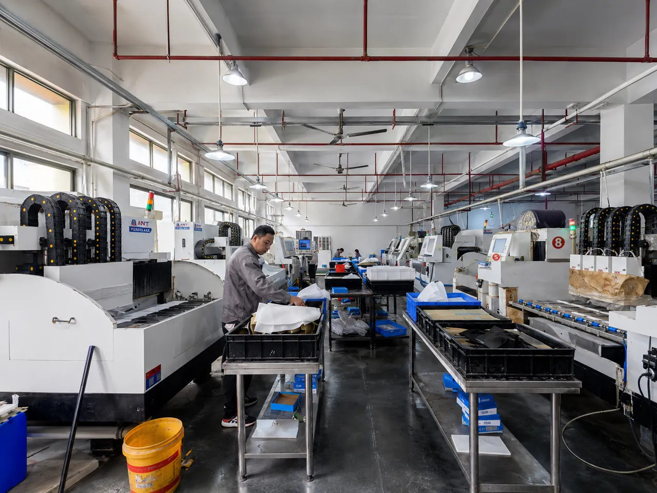 CNC glass machining workshop for custom precision glass components at ANTGLASS